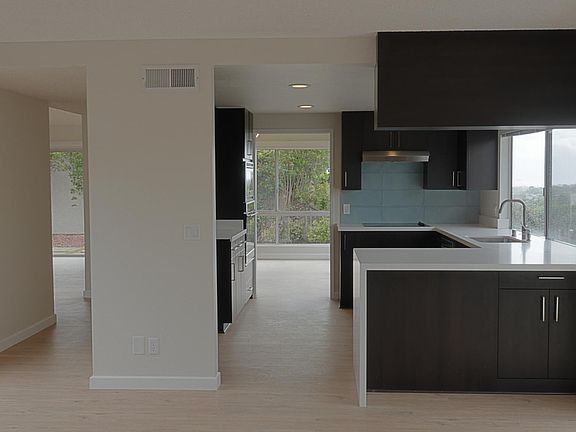 Kitchen Open To Dining Room and Family Room