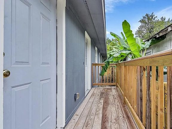 Back porch with 2 exterior doors.
