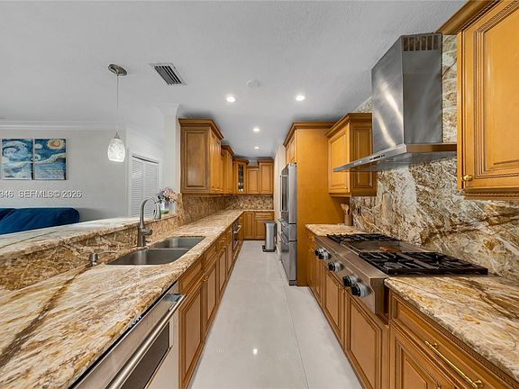 2nd image of 5862 W 2nd Ct