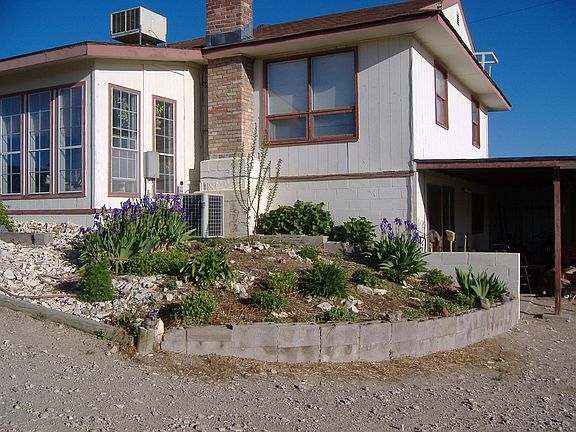 Rear & drive to carport