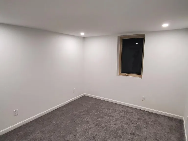 Downstairs bedroom with egress window