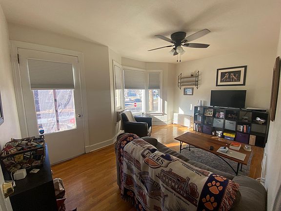 Living room, door on the left walks out to your private balcony with mountain views.