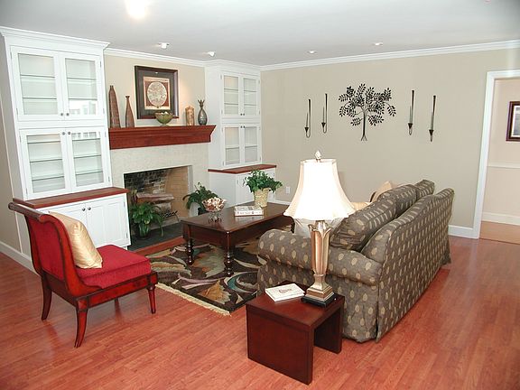 Formal Living room with fireplace and built-ins