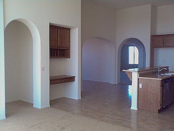 Living room looking into Kitchen and front room