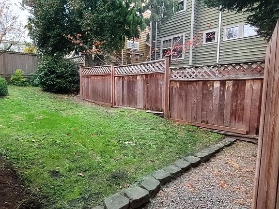 Unit's own, fully fenced, private use backyard.