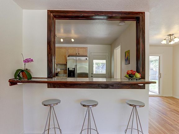 kitchen bar area opens to large living room