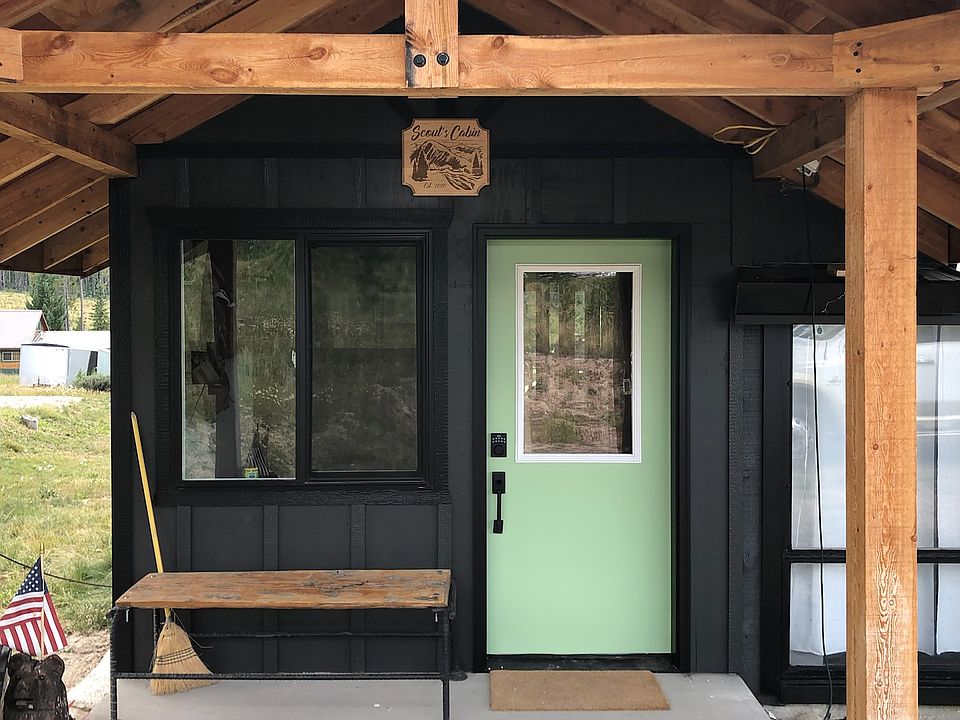 Front door with brand new built entry way and mud room and fresh exterior paint.