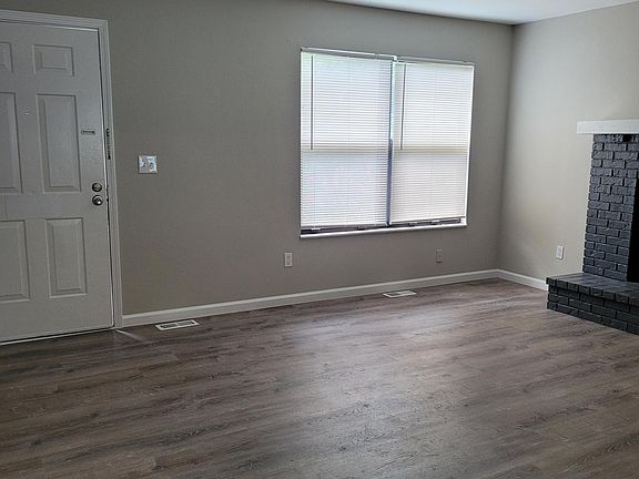 Living Room with working wood fireplace