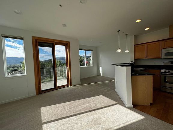 Beautiful mountain and lake views from kitchen, dinning area and private deck