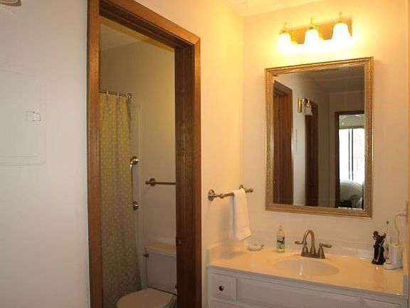 Bath with vanity in separate area