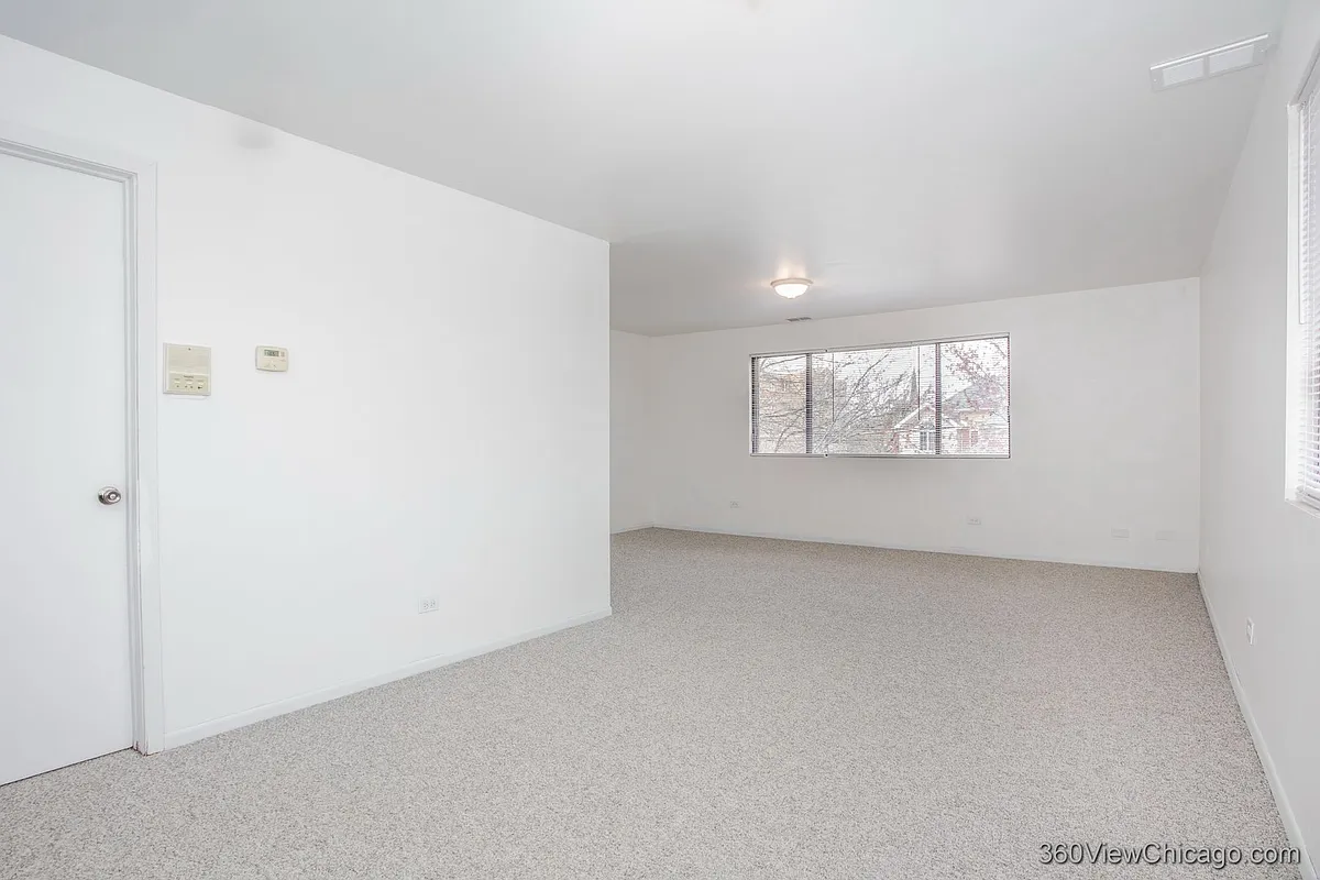 Building Photo - 7459 N Waukegan Rd #3
