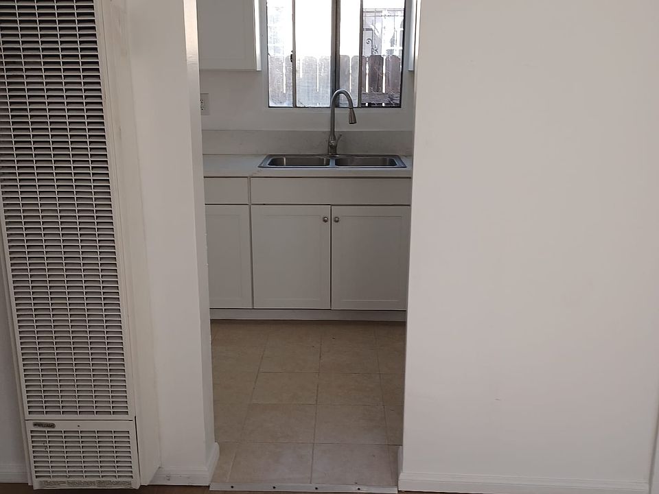 1st image of 221 1/4 W 85th Pl #221-1/4