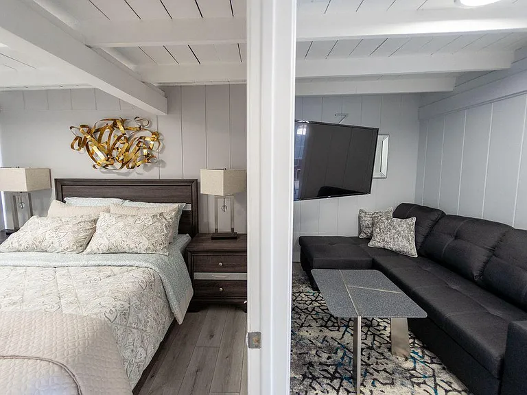 SPLIT VIEW OF BEDROOM & LIVING ROOM