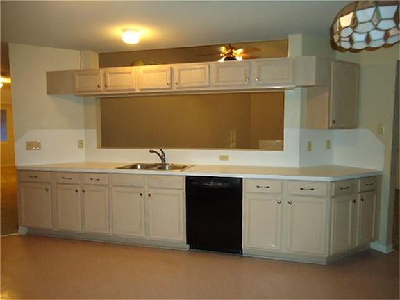 Another view of kitchen looking into the living area