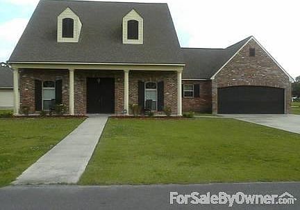 Acadian Style Home with Century Old Antique Bricks!