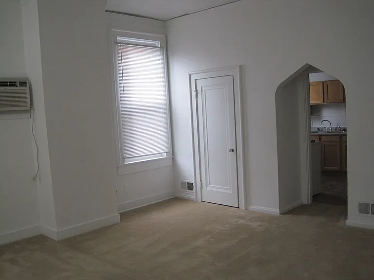 The living room showing the third window.