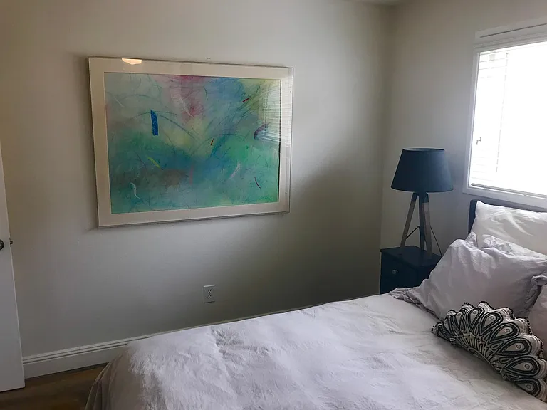 More art! Flat screen smart tv in this room too.
