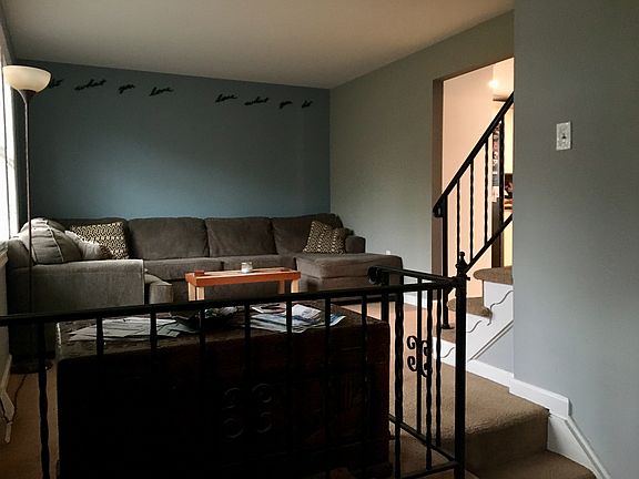 Living room next to kitchen