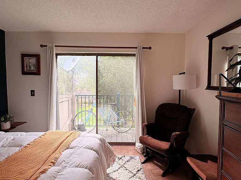 Bedroom and dining room open to private balcony w/ storage