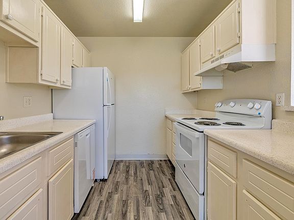 Bright kitchen with ample storage and contemporary appliances.