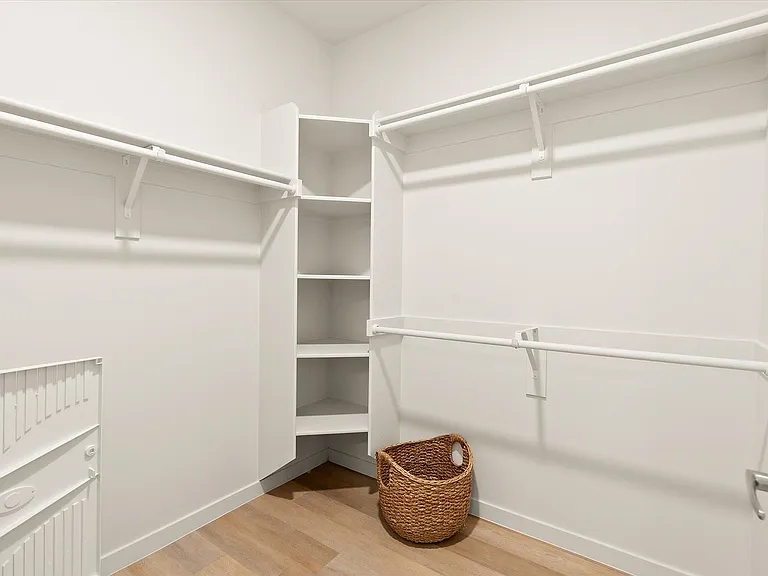 Large Walk-In Closet with Built-In Storage