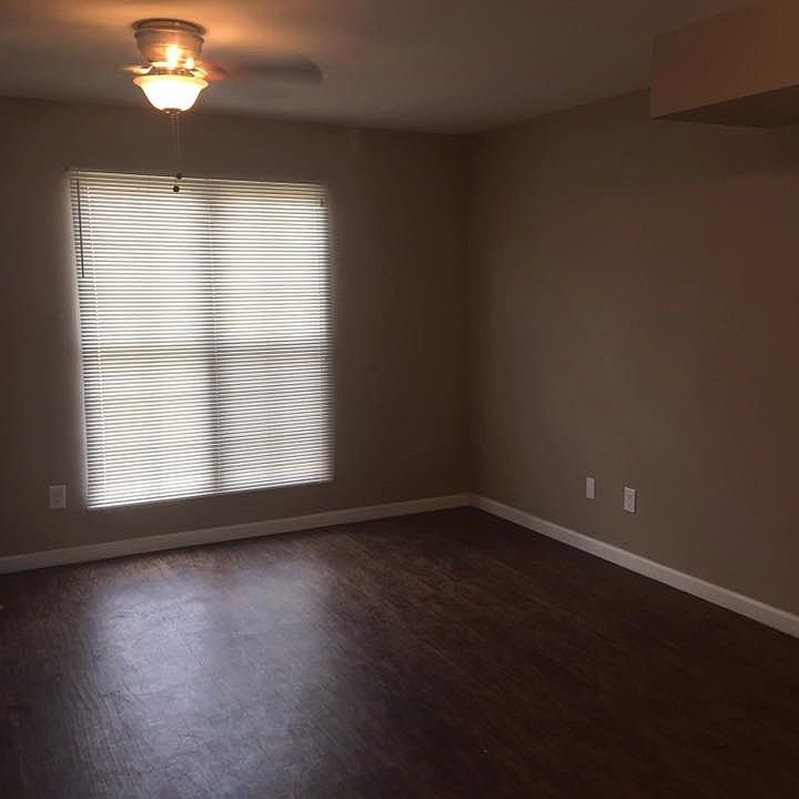 Large living area windows allows tons of natural lighting