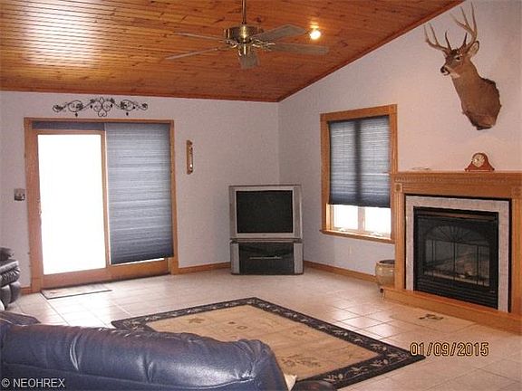 Great Room also features sliding doors that lead to the deck where you will find a relaxing HOT TUB.