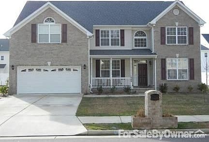 Front view
						:
						Beautiful landscaping in front and back.