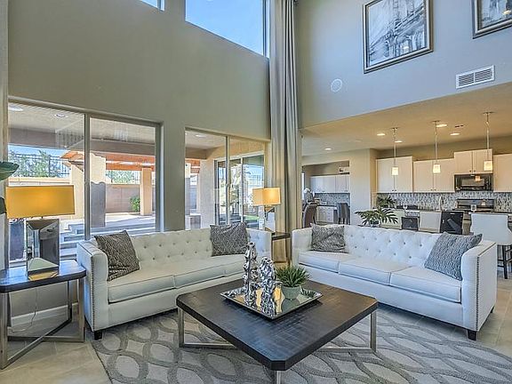 Spacious first floor with two-story ceilings in gathering room.