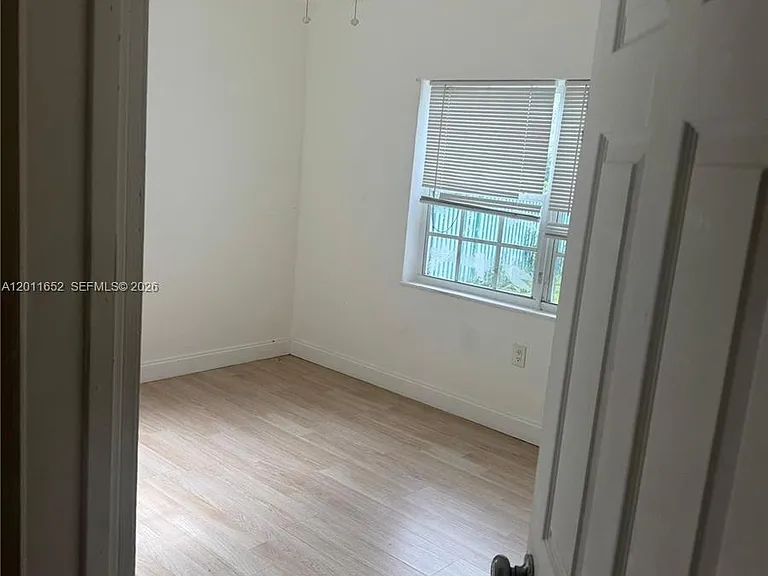 411 NW 106th St — Photo 12