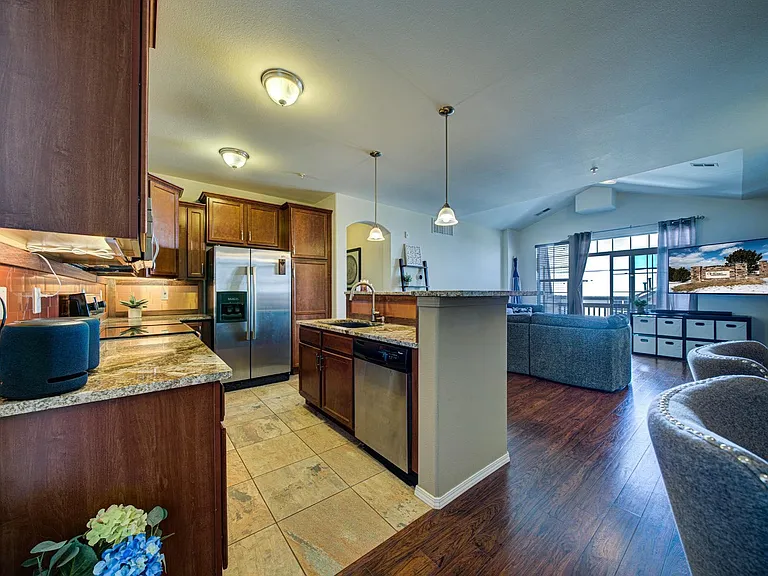 Copper backsplash in the kitchen. Amazon Alexa controls lights and heater.