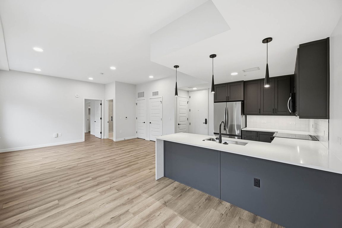 Large living room with open concept kitchen
