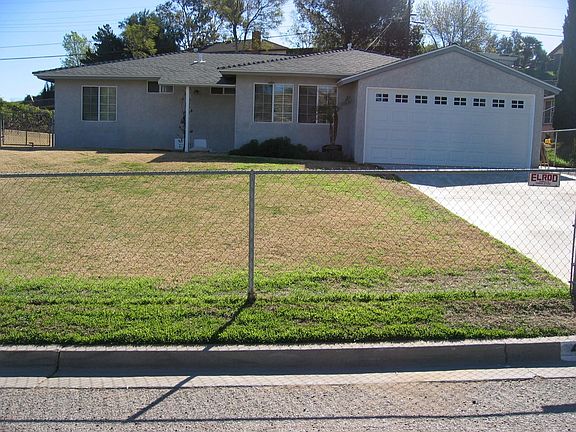 Large fenced in front yard