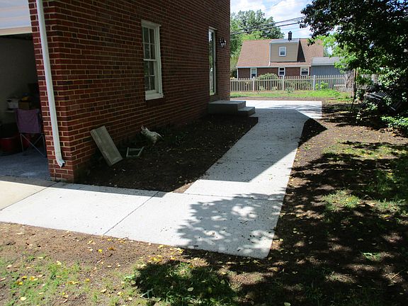 Sidewalk to Rear Patio and Yard