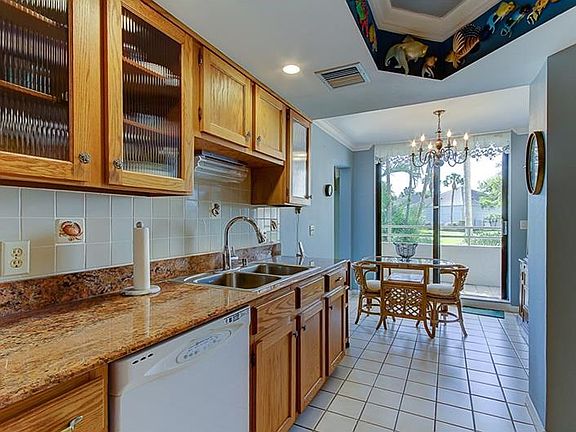 5th image of 5940 Pelican Bay Plz S APT 103