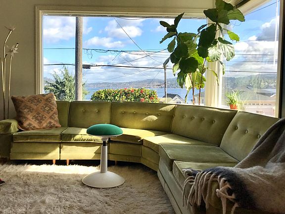Living room furnished by previous tenants.