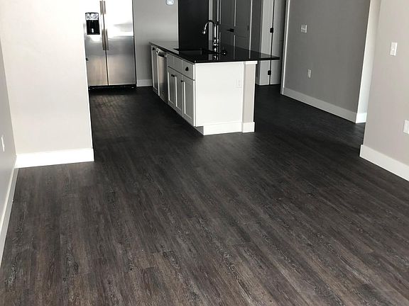 Large living room extends from the kitchen area