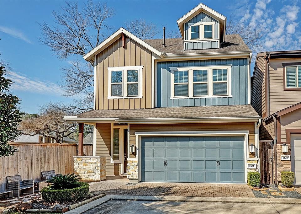 Nestled in the back of the community with a front grassy area and guest parking in front.