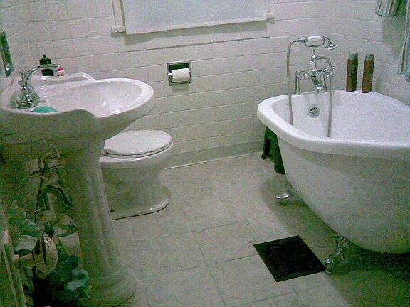 remeodled bath with claw foot tub