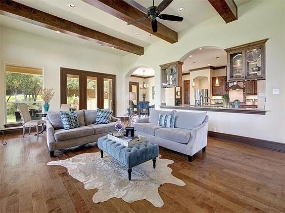 Natural light abounds! Family room, sitting area, breakfast room, and kitchen are all united in one.
