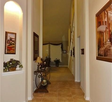 Step into your beautiful new home through this grand entry way.