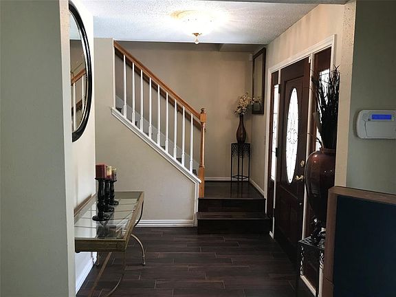 Beautiful foyer is welcoming to guests