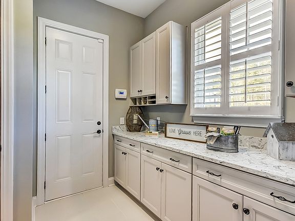 Laundry room with cabinet space