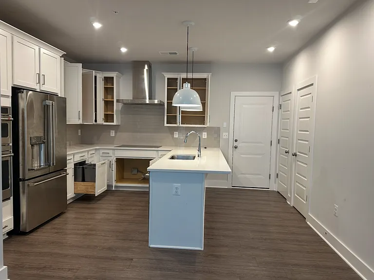 Actual photo of kitchen and garage entry