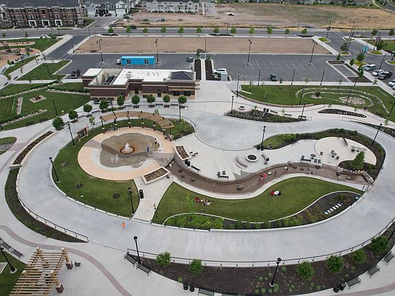 J Lynn Crane Park, playground, splash pad and ice rink right across the street