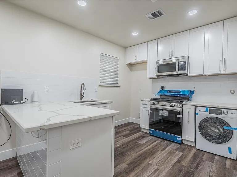 6003 De Moss Dr — Photo 23