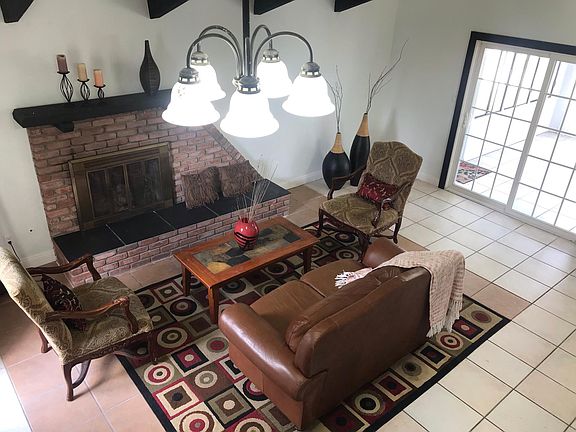 Living room with cathedral/vaulted ceiling