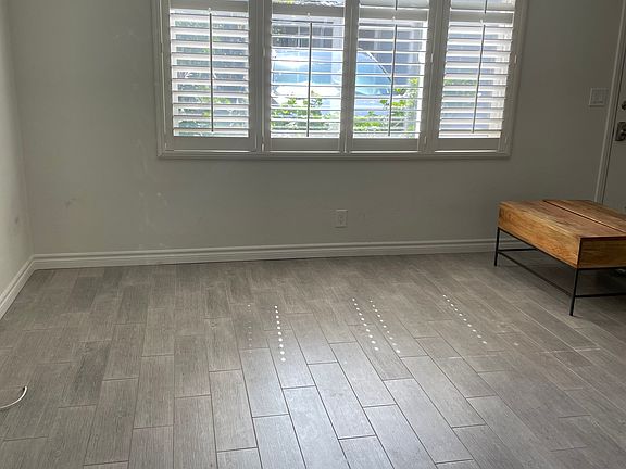living room with plantation shutters