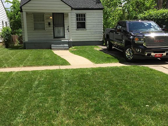 Front of home showing off-street parking, newer roof, covered porch