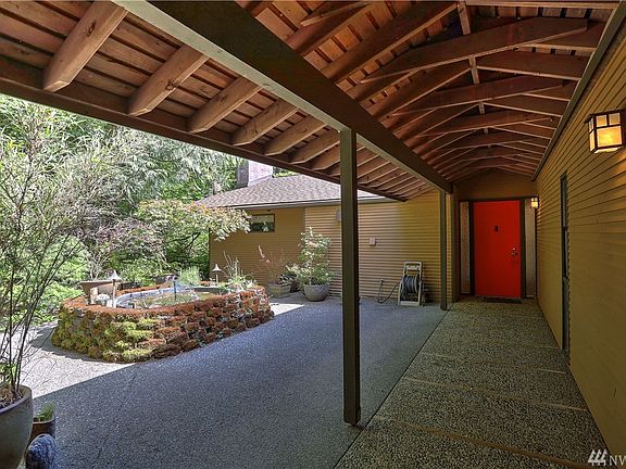 Covered breezeway from driveway to the front door. 